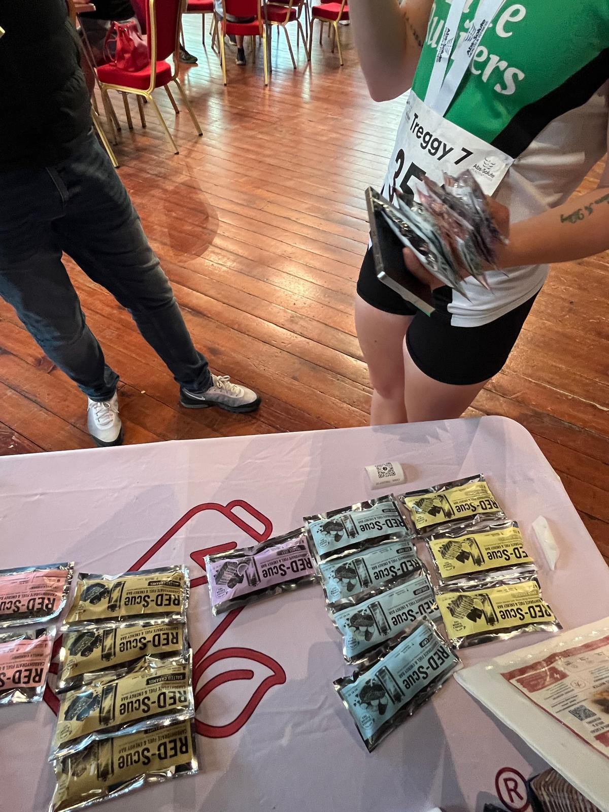 RED-Scue bars at a running event